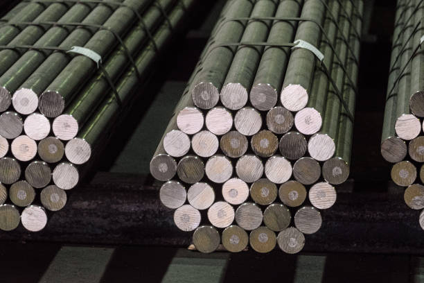 Round steel section rolling profile in stacked. Warehouse of metal products. stock photo