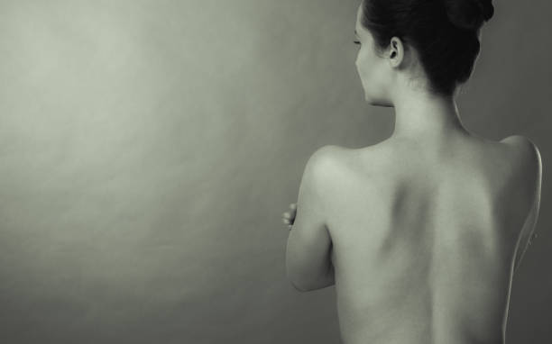 istock Young woman with naked back 1170279438