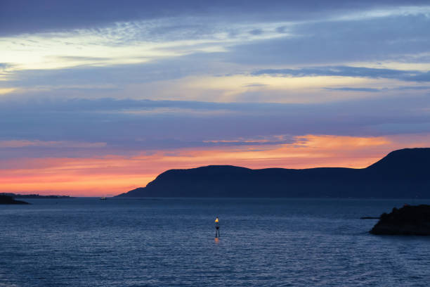 Twilight in the Haroyefjord on the way to the Norwegian town Aalesund