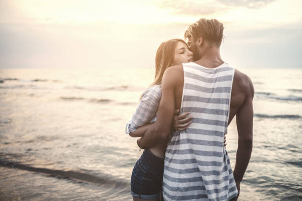 istock In love couple at the beach 1170280800