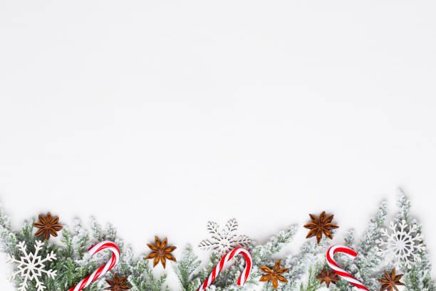 istock Christmas white Fir tree branches with stars decorations. 1170284269
