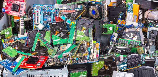 E-waste sorting, recycling and disposal. Used computer parts. Electronic, plastic and metal refuse