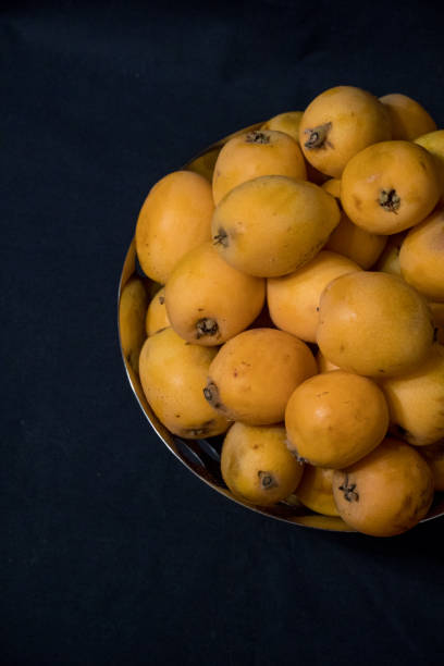 istock Medlars in a stainless steal fruit bowl 1170284580
