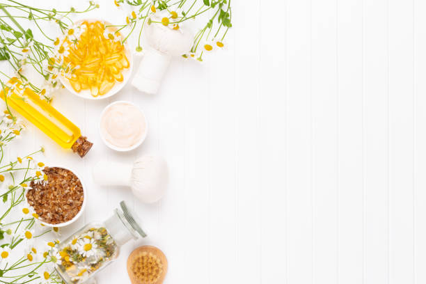 istock Spa still life with aromatherapy chamomile, herbal oil, soap, sea salt. 1170284614