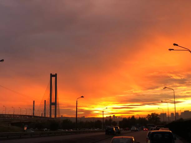 istock sunset and bridge with cars 1170285495