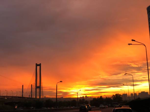 istock sunset and bridge with cars 1170285500