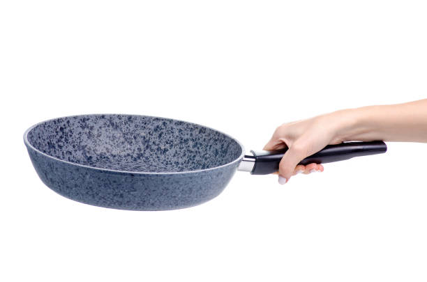 istock Pan in hand cooking food 1170285962