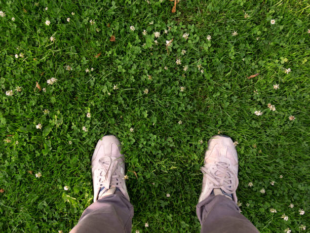 Feet in the grass.