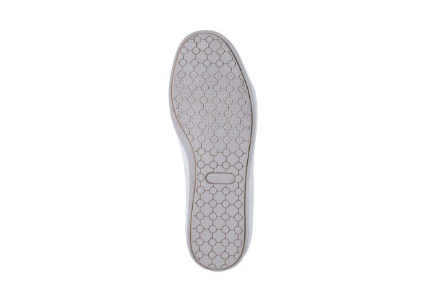 istock White rubber sole with sneakers on a white background. 1170288194