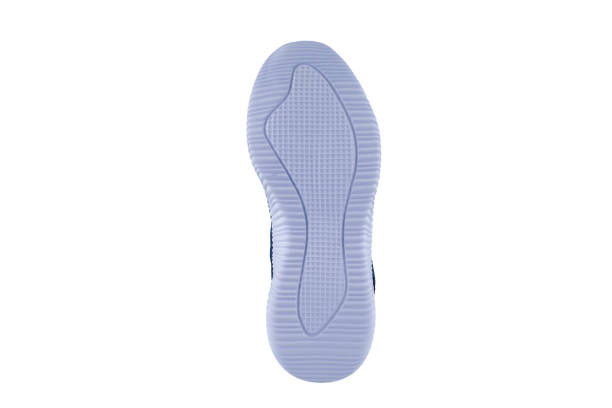 istock White rubber sole with sneakers on a white background. 1170288246