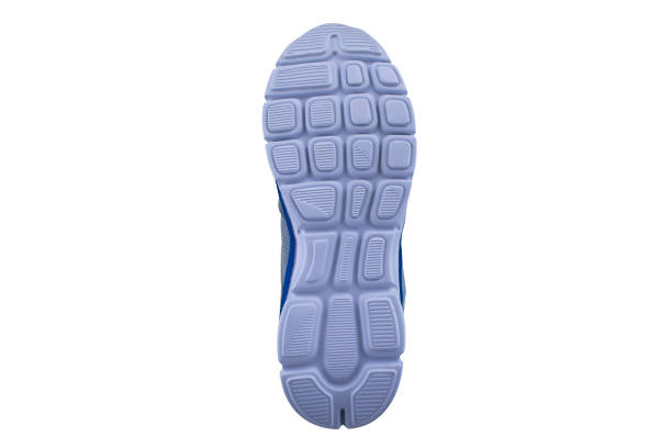 istock White rubber sole with sneakers on a white background. 1170288862