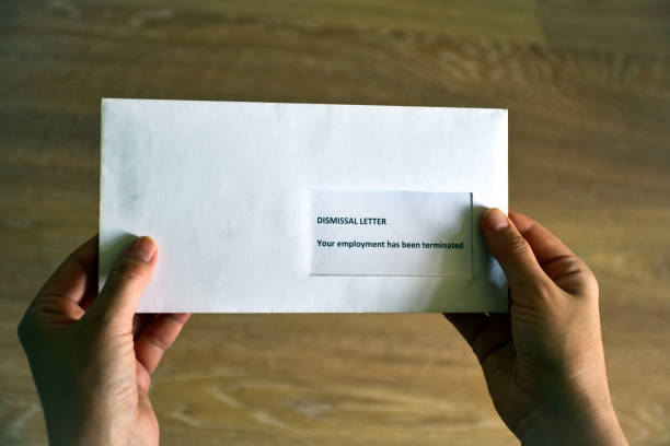 istock Receiving a Dismissal Letter on the desktop 1170289588