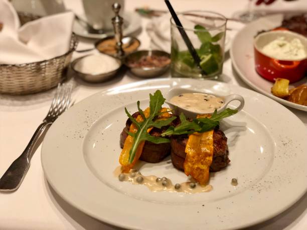istock steaks in a restaurant with sauce 1170289691
