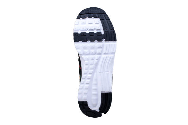 istock Black sole sneakers with white stripes on a white background. 1170289731