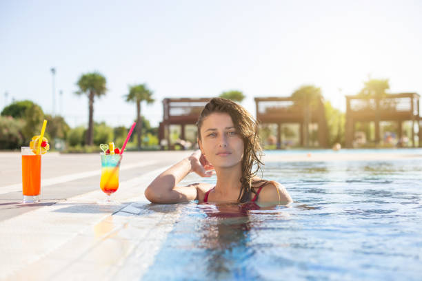 istock Woman and drinkable cocktails. 1170289775