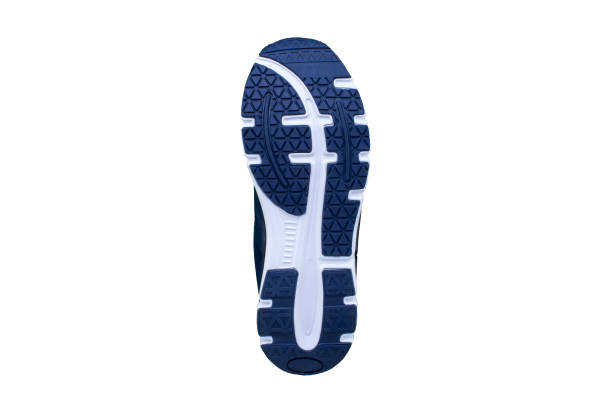 istock Blue rubber sole with sneakers on a white background. 1170289865