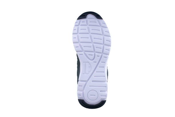 istock White-gray rubber sole with sneakers on a white background. 1170290017