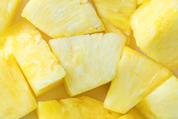 istock Cut pine apple background, close-up 1170291194