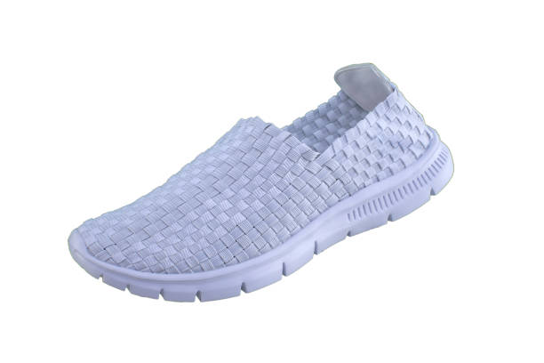istock White sneaker on a white sole. Sport shoes on a white background. 1170291449