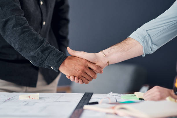 istock Joining forces to achieve combined success 1170293763