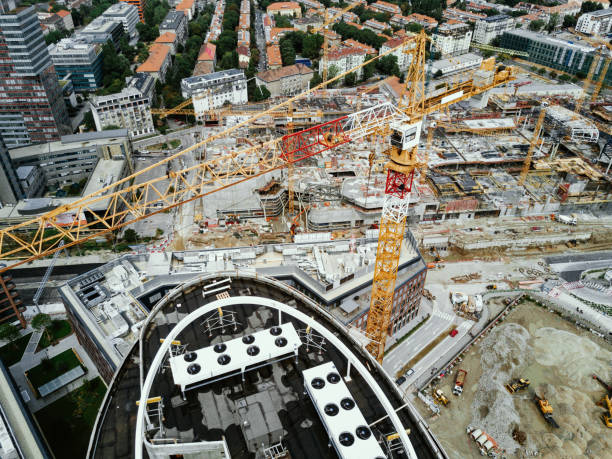 istock Construction industry - building skyscrapers in downtown, construction site seen from above 1170295208