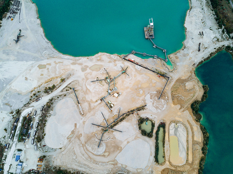 Sand mining in the lake and extraction process