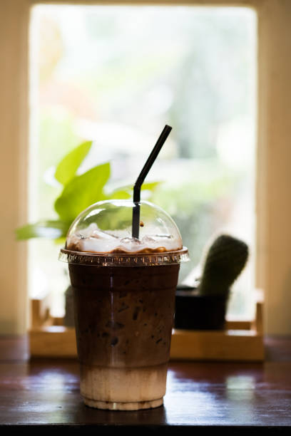 istock Iced mocha coffee on wooden table. Morning refreshing drink. 1170296148