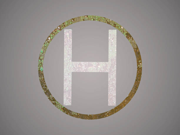 helicopter helipad on the asphalt surface with letter 
