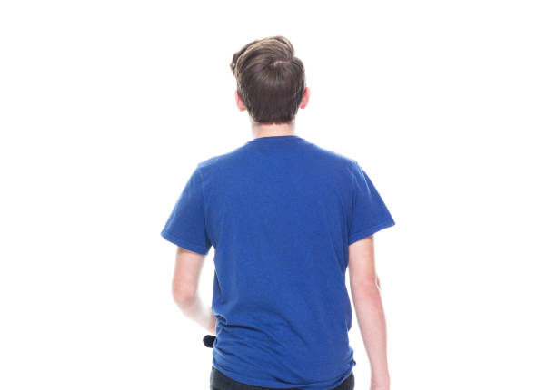 istock Young high school age male walking 1170296643