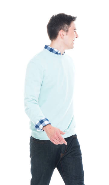 istock Handsome young man walking and looking behind 1170298022