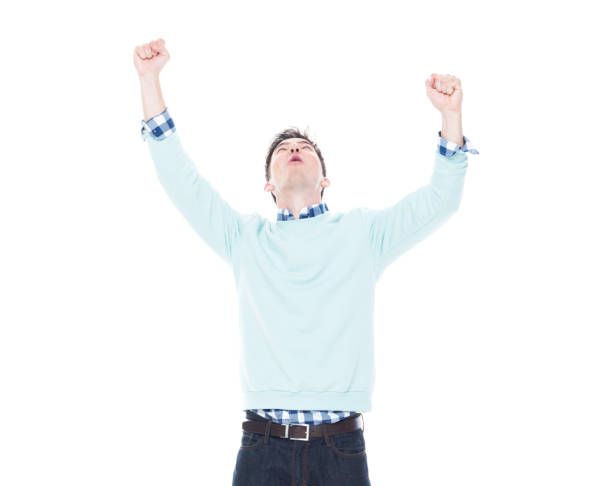istock Handsome young man looking up and cheering 1170298292