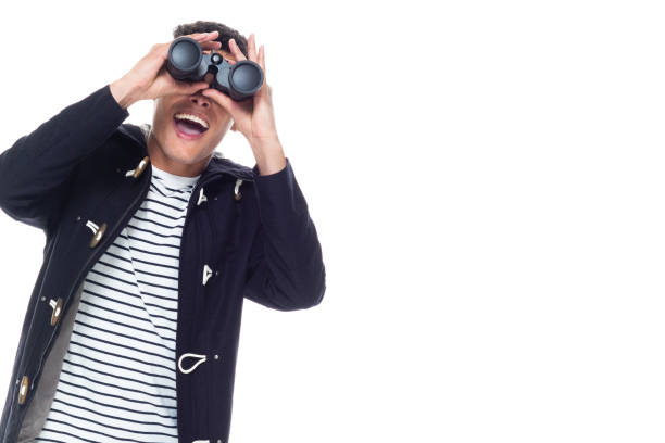 Handsome black man with curly hair and wearing a jacket - binoculars