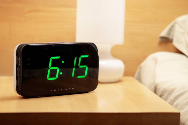 istock digital clock shows 06.15 am 1170302693