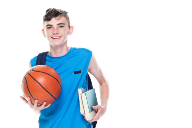 istock 13 year old male basketball player who is also a student 1170302869