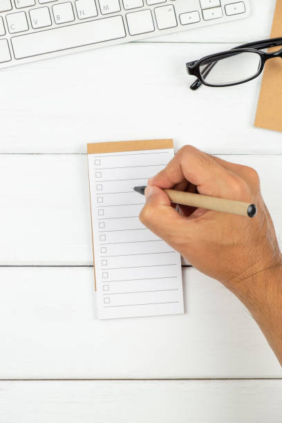 istock A man is writing on To Do List paper 1170302970