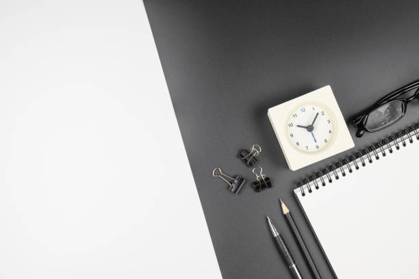 istock Top view of an open notebook with stationery items 1170303507