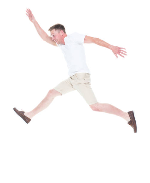 istock Handsome man in shirt and shorts is jumping with happiness, side view 1170303702
