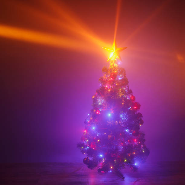 istock Christmas tree with festive lights, purple background 1170306584
