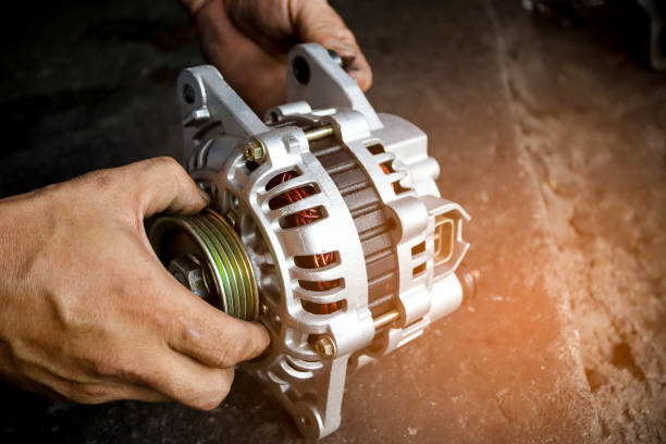 Change New Car Alternator With Hand In The Garage Or Auto Repair Service  Center As Background Automotive Concept Dark Tone Stock Photo - Download  Image Now - iStock
