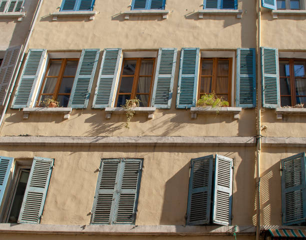 Marseille windows with colored blinds