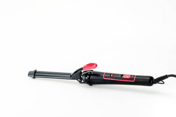 istock Hair iron on white mat background with copy space 1170308105