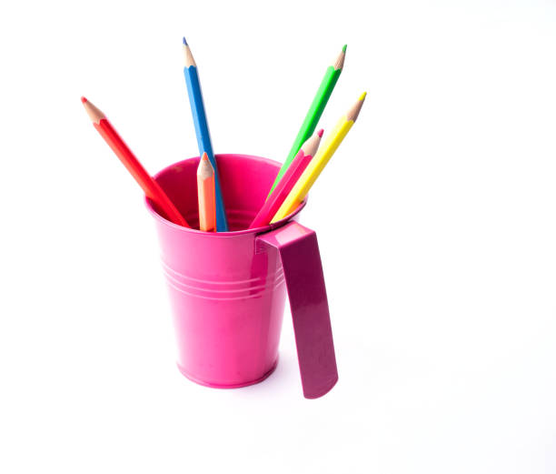 istock Colorful pencils in pail isolated on white. 1170308630
