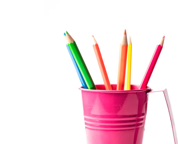 istock Colorful pencils in pail isolated on white. 1170308631