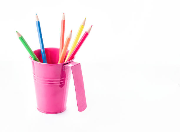 istock Colorful pencils in pail isolated on white. 1170308644