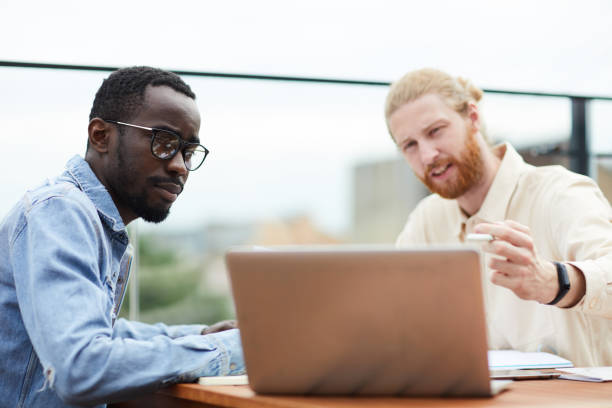 istock Business partners working on laptop 1170311117