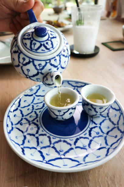 istock hot tea, pouring some tea 1170316205