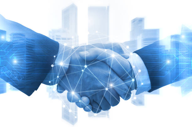 istock Partnership - business man shaking hands with effect digital network link connection graphic diagram, digital global technology with cityscape background, internet communication and teamwork concept 1170319035
