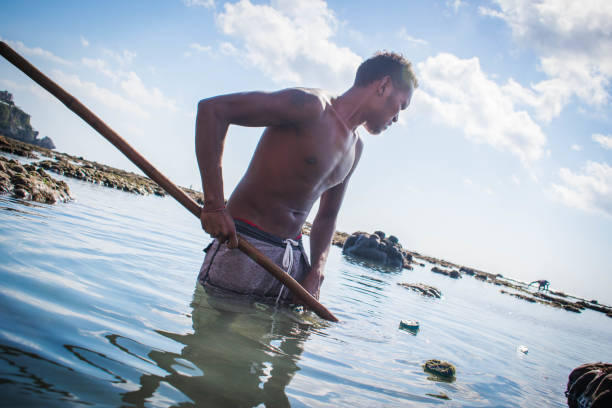 istock Balinese fisherman 1170325477