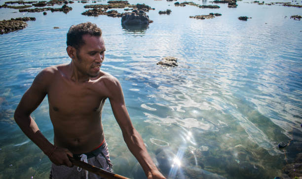 istock Asian Fisherman 1170325495