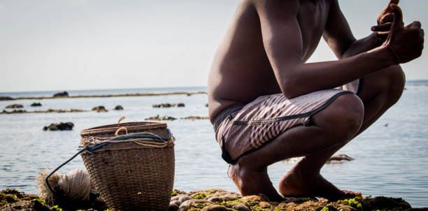 istock Asian Fisherman 1170325526
